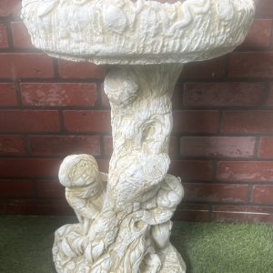 Boy and girl birdbath cream