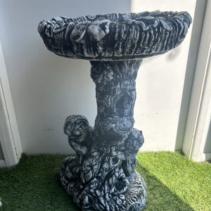Boy and girl birdbath